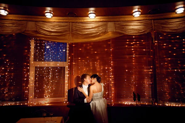 Couple by the window — Stock Photo, Image