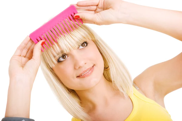 Girl with comb — Stock Photo, Image
