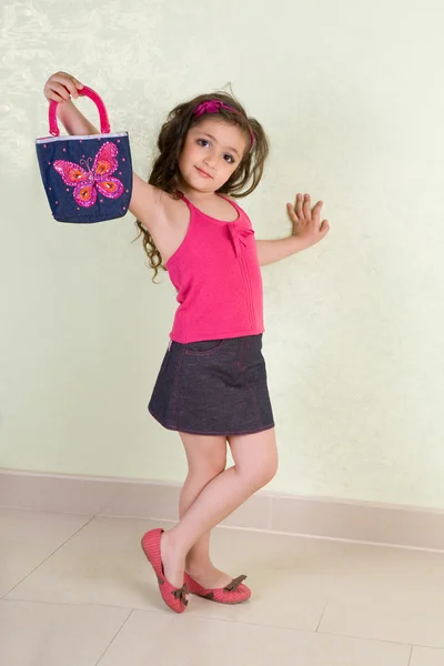 Niña con bolsa —  Fotos de Stock