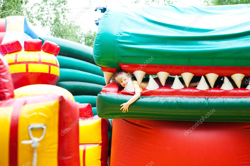 girl in the inflatable entertainment park