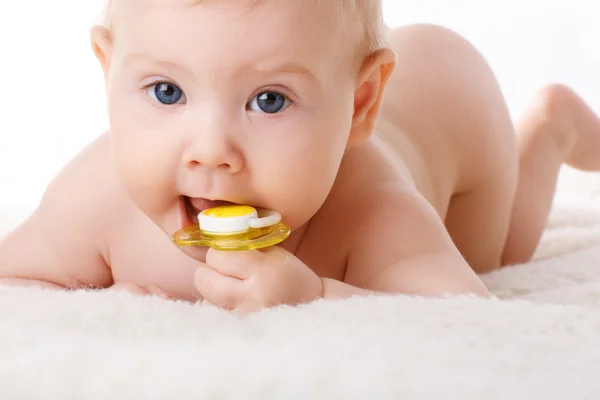 Child with dummy — Stock Photo, Image