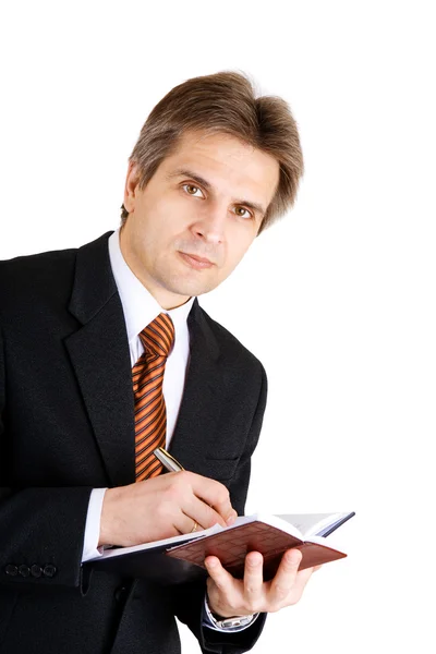 Busy bisnessman writing — Stock Photo, Image