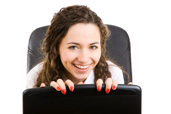 Happy businesswoman in armchair Stock Picture