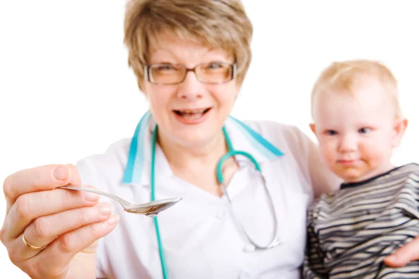 Taking remedy-focus on the spoon — Stock Photo, Image