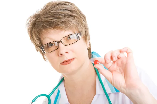 Doctor with one pill — Stock Photo, Image