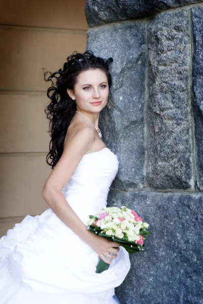 Sonrisa y piedra — Foto de Stock