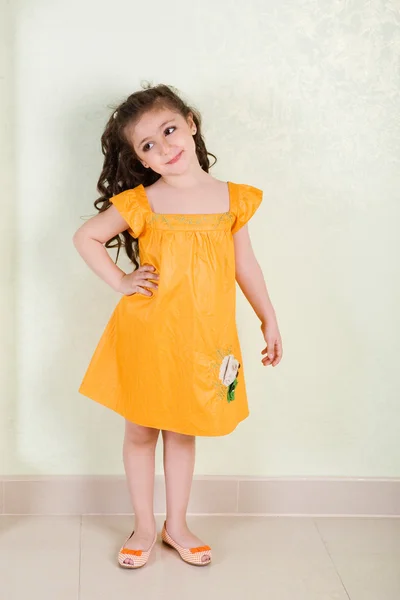 In yellow dress — Stock Photo, Image