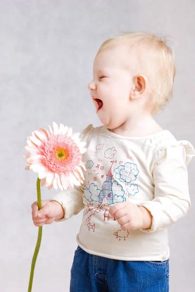 Laughing with flower — Stock Photo, Image