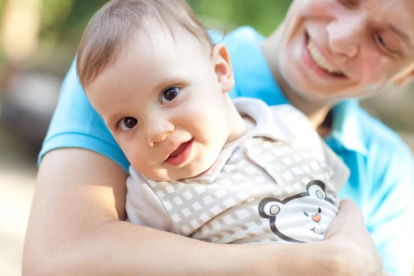 Happy boy in fathers hands — Stock Photo, Image