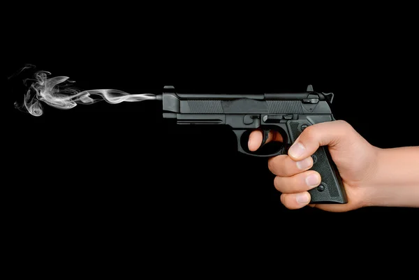 Gun in the hand — Stock Photo, Image