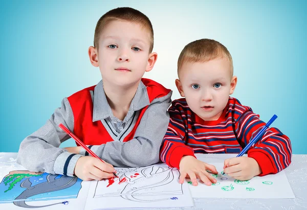 Child learns to write — Stock Photo, Image