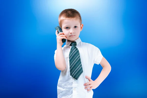 Niño con el teléfono —  Fotos de Stock