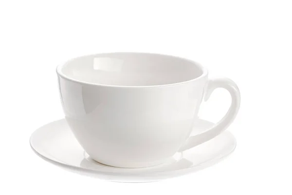 Tasse de thé en porcelaine avec du lait isolé sur fond blanc — Photo