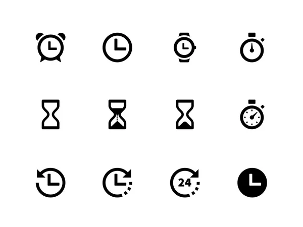 Tijd en klok pictogrammen op witte achtergrond. — Stockvector