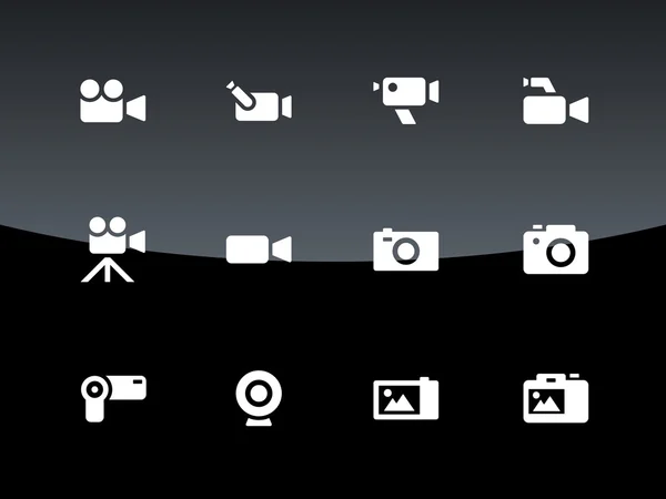 Camera icons on black background. — Stock Vector