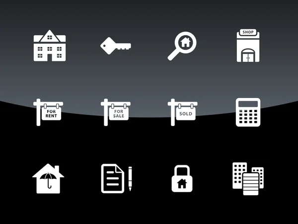 Icônes immobilières sur fond noir . — Image vectorielle