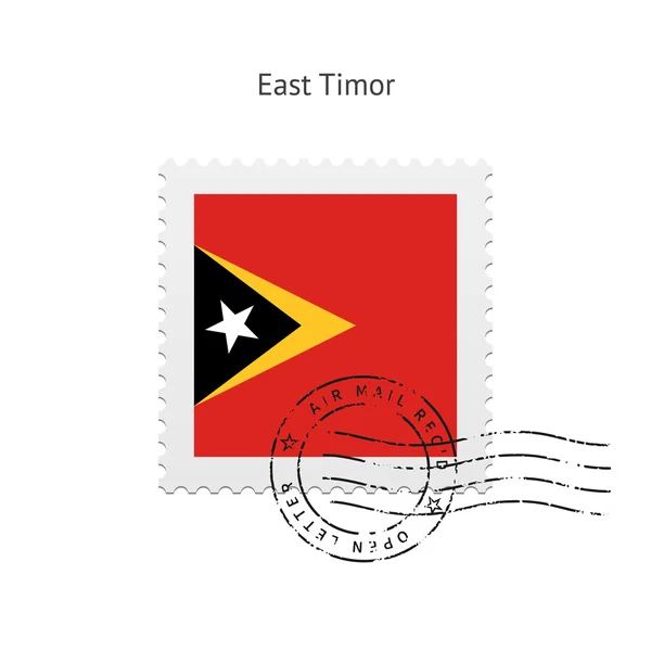 Östtimor flagga frimärke. — Stock vektor