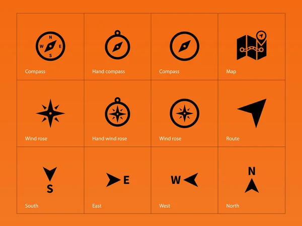 Compass icons on orange background. — Stock Vector