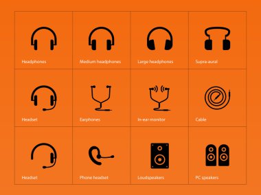 Headphones icons on orange background. clipart