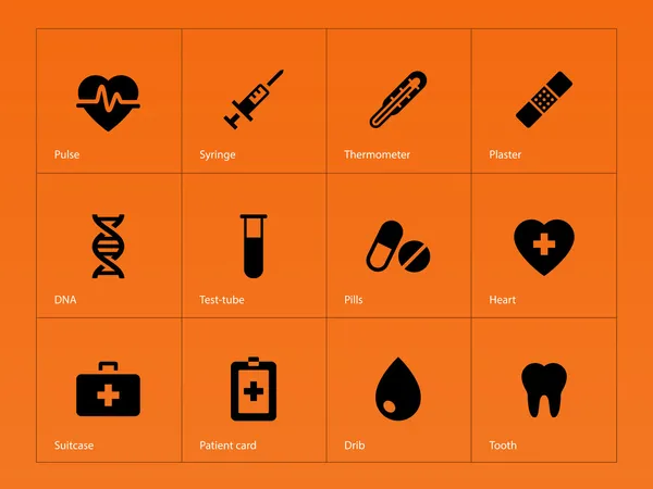 Icônes médicales sur fond orange . — Image vectorielle