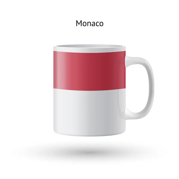 Taza de recuerdo bandera de Mónaco sobre fondo blanco . — Vector de stock