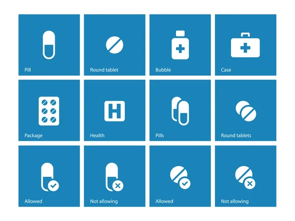 Pillen en capsules pictogrammen op blauwe achtergrond. — Stockvector