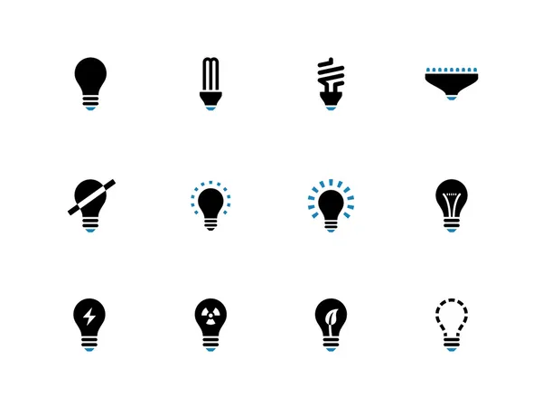 Gloeilamp en cfl lamp duotoon pictogrammen. — Stockvector