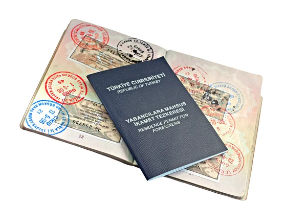 UK passport with Turkish visitor visa's and residence permit — ストック写真