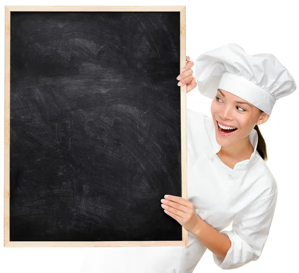 Chef mostrando signo de menú en blanco — Foto de Stock