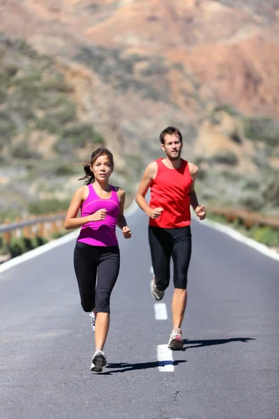 Running couple — Stock Photo, Image