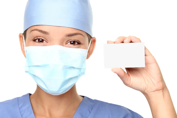 Medical person showing business card — Stock Photo, Image