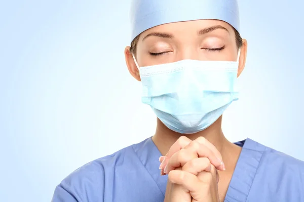 Medical doctor praying — Stock Photo, Image