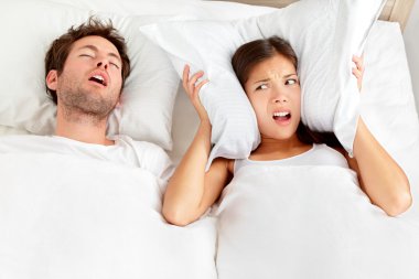 Snoring man - couple in bed clipart