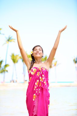 Free spiritual woman on hawaii on beach clipart