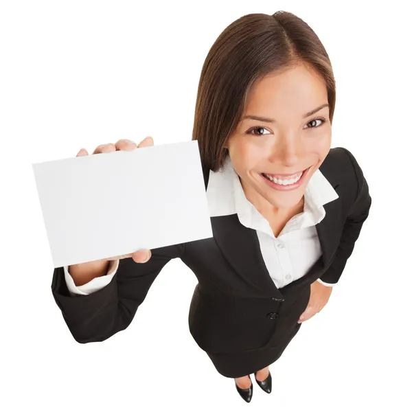 Mujer de negocios mostrando signo de tarjeta en blanco — Foto de Stock