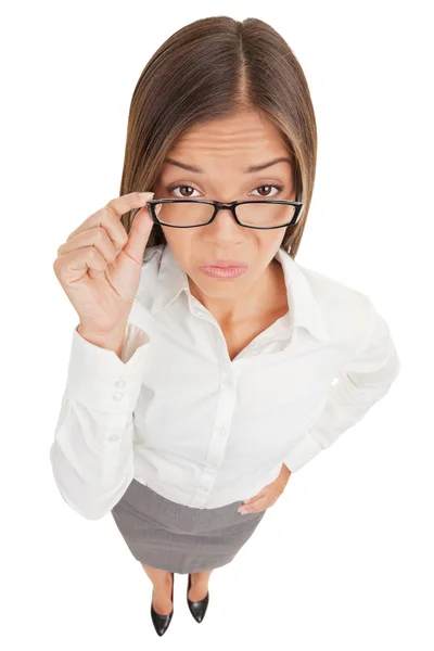 Misstänkta arg sekreterare lyfter hennes glasögon — Stockfoto