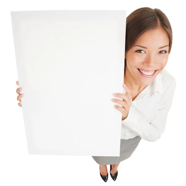 Woman showing a white board sign poster Stock Photo