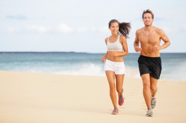 Runners - Young couple running on beach clipart