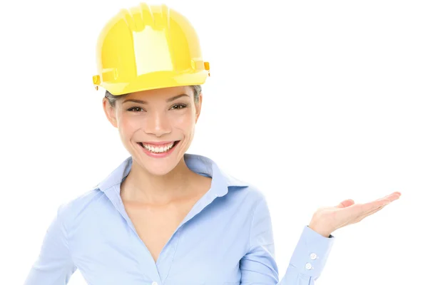 Hard hat engineer or architect woman showing — Stock Photo, Image