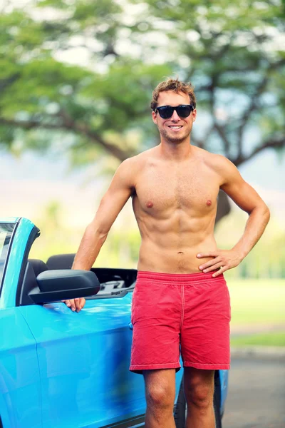 Bello uomo con auto sportive — Foto Stock