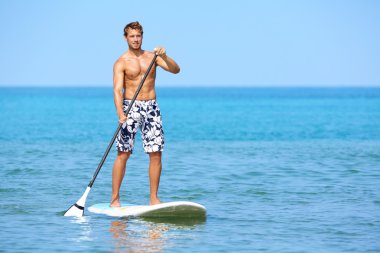 Stand up paddle board man paddleboarding clipart