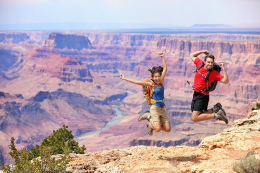 Happy jumping in Grand Canyon clipart
