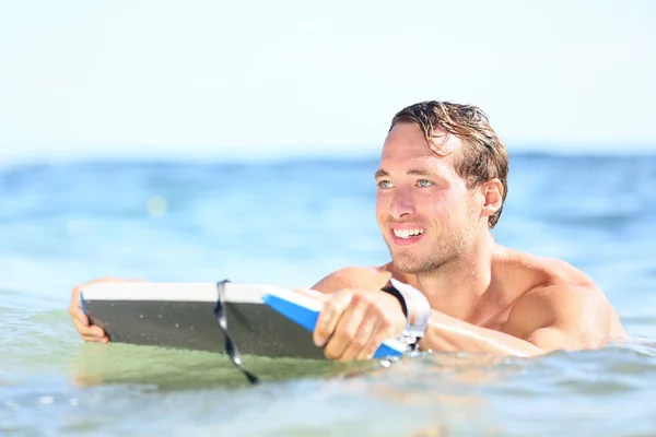 Beach fun - man bodyboarding on bodyboard — Stock Photo, Image