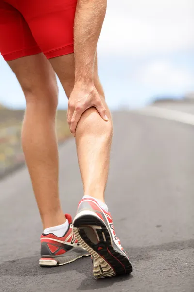 Cramps in leg calves — Stock Photo, Image