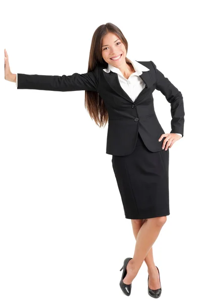 Young Businesswoman Leaning On Wall Stock Image