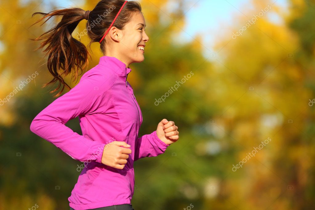 Woman running in autumn fall forest — Stock Photo © Maridav 28788507