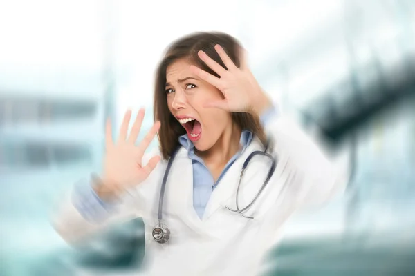 Surprised shocked scared doctor woman afraid — Stock Photo, Image