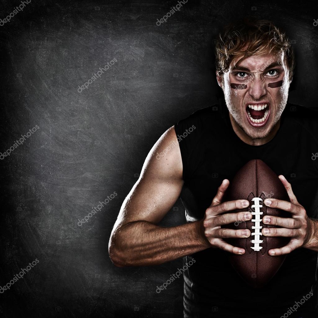 Football player aggressive with american football — Stock Photo