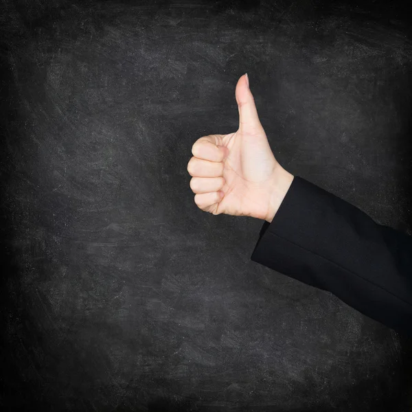 Thumbs up hand on blackboard, chalkboard — Stock Photo, Image