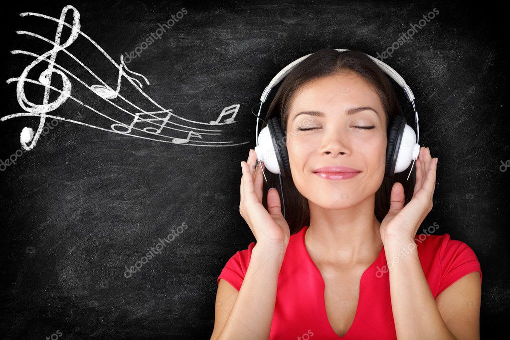 Music woman wearing headphones listening to music stock photo maridav 31779211